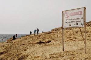 zoloft and alcohol danger sign on beach