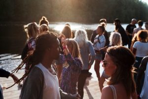 sober socializing party by a river