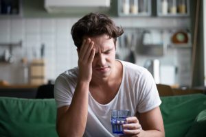 how alcohol affects your health man with hangover