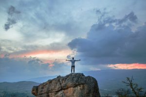 recovery quotes man with arms open to the sky