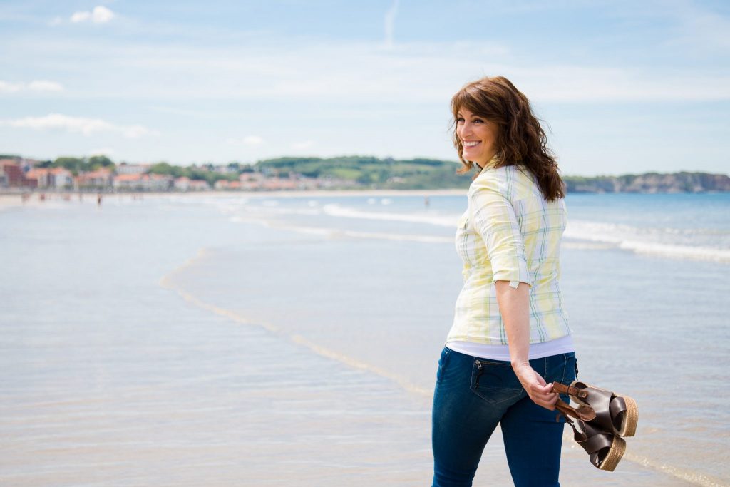 smiling woman on beach