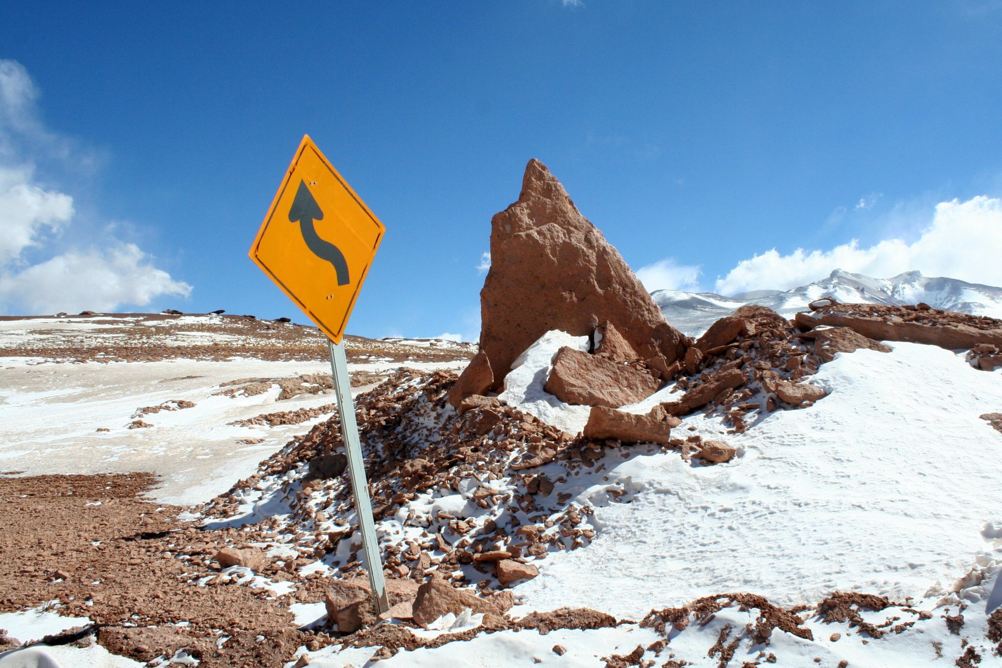 signs you should cut back on drinking, sign by a rock