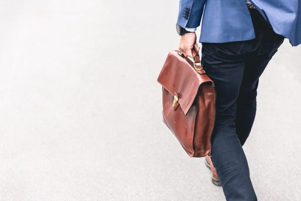 person walking with briefcase, high-functioning alcoholic