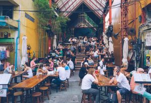 people sitting in beer hall, keeping party drinking under control