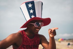 man in funny hat on beach drunk personalities