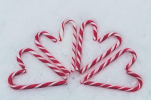 candy canes on snow, holiday heart syndrome