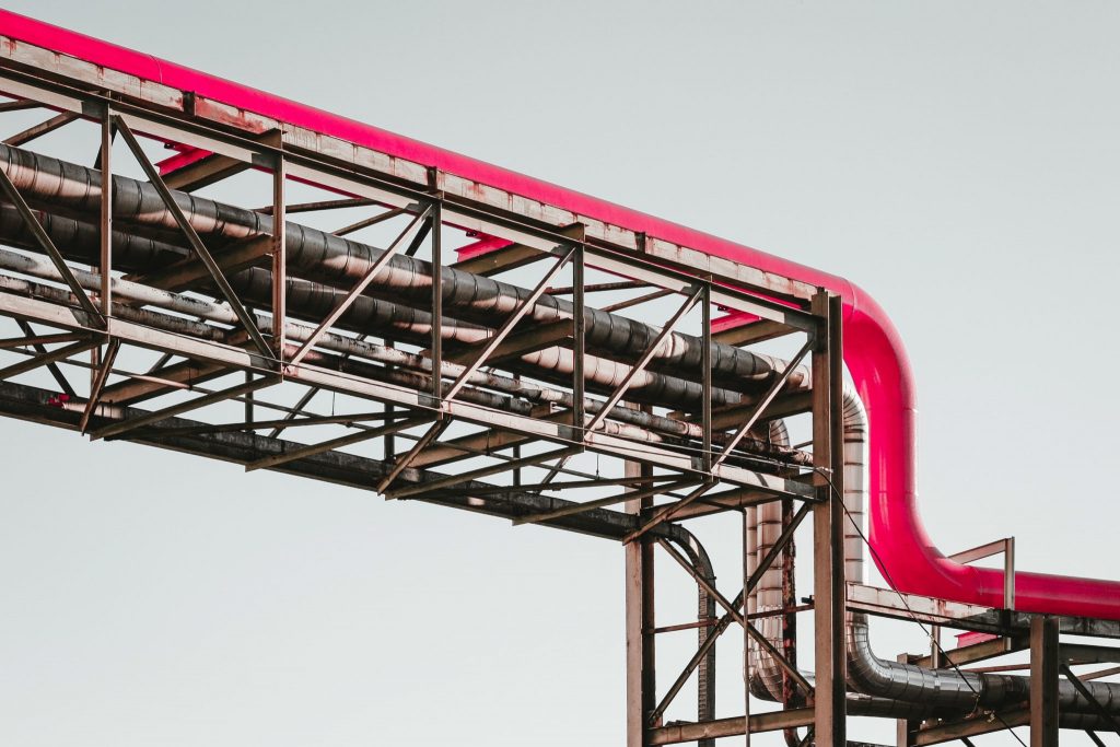 metal tower with red tube, alcohol and blood pressure