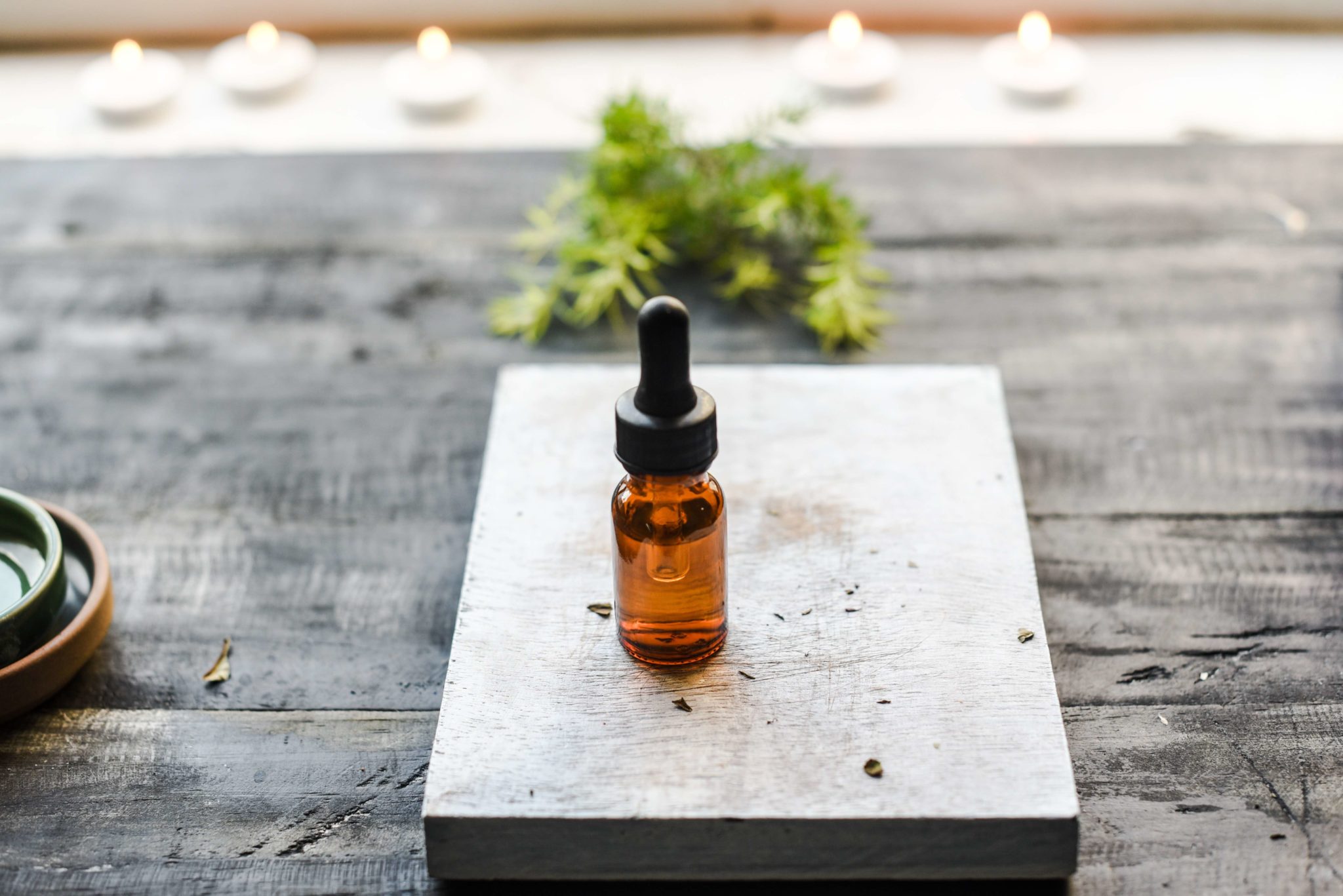 bottle on table, essential oils for alcoholism