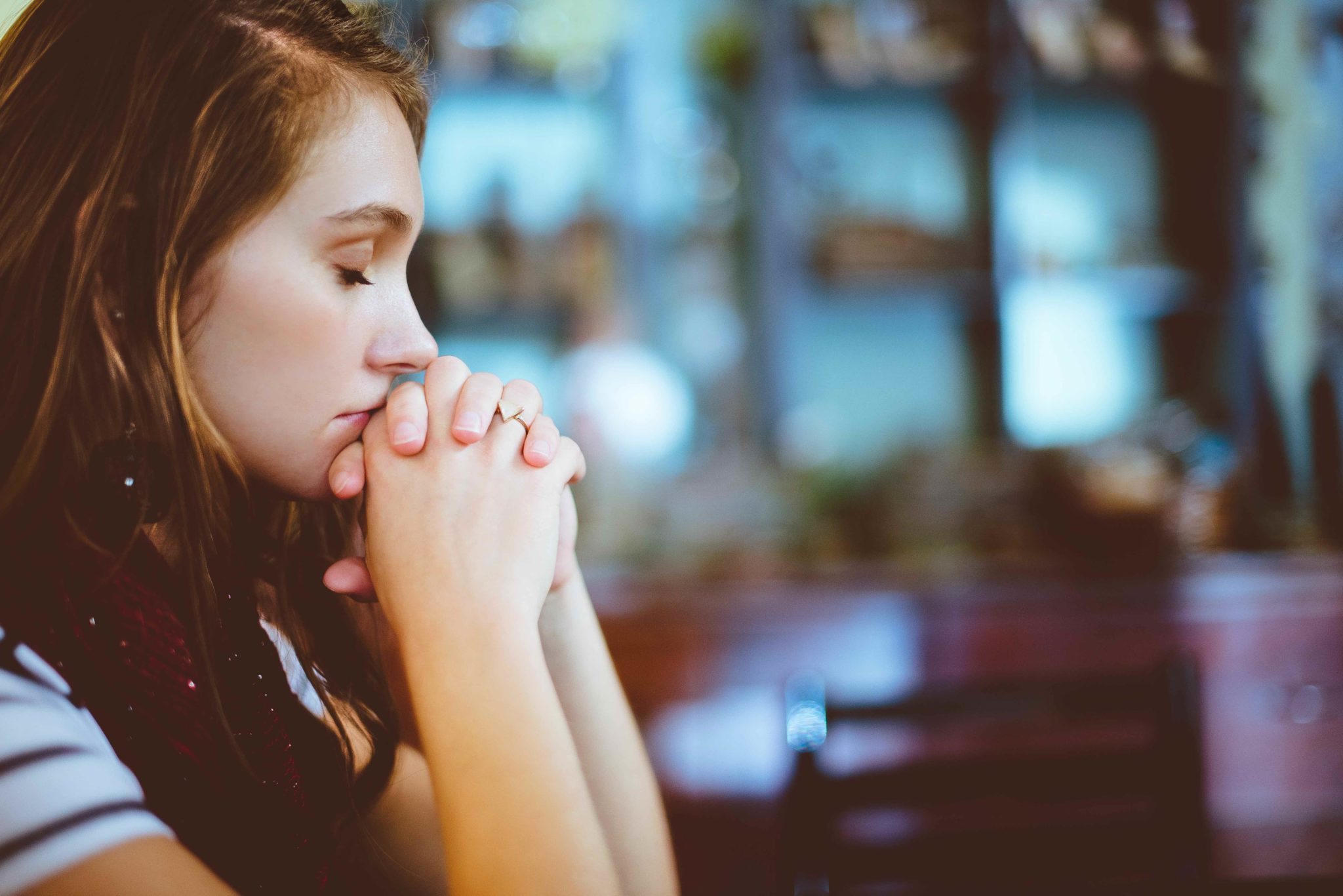 Woman meditating, how to stop thinking about alcohol