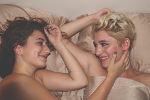two women in bed, alcohol and sex