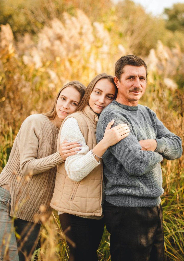 father and two daughters