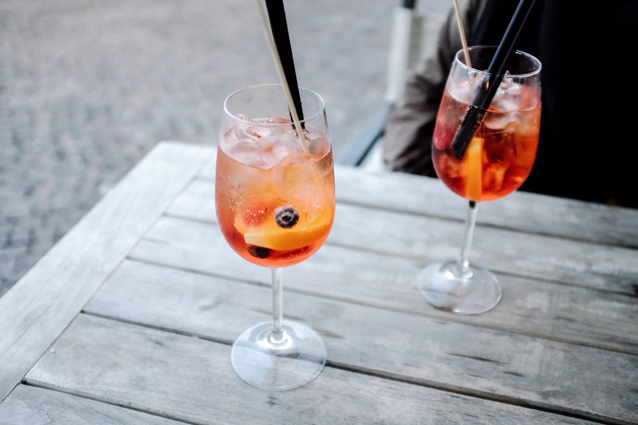 two similar alcoholic cocktails on a table