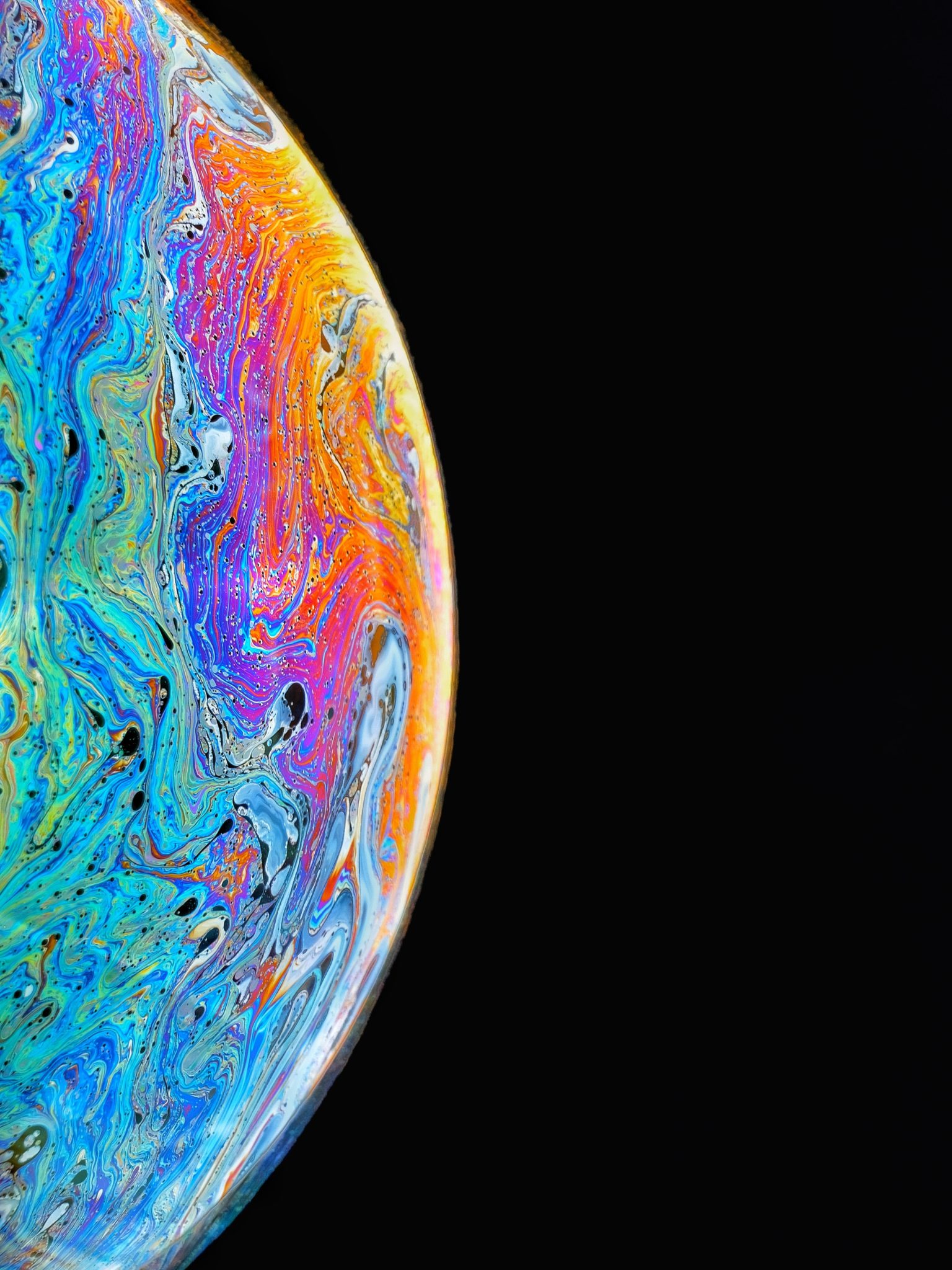 half of psychedelic globe on black background