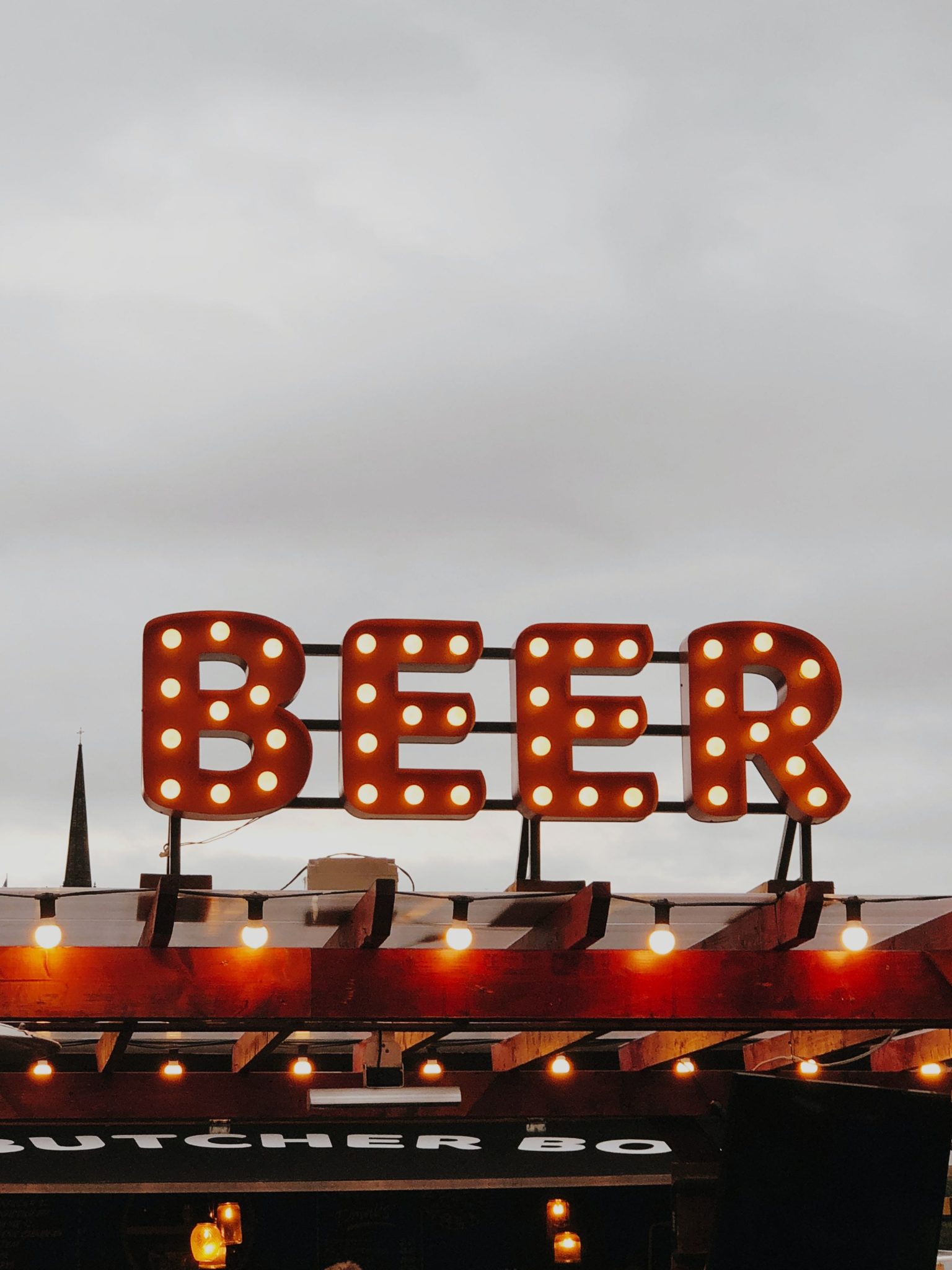 beer sign on roof