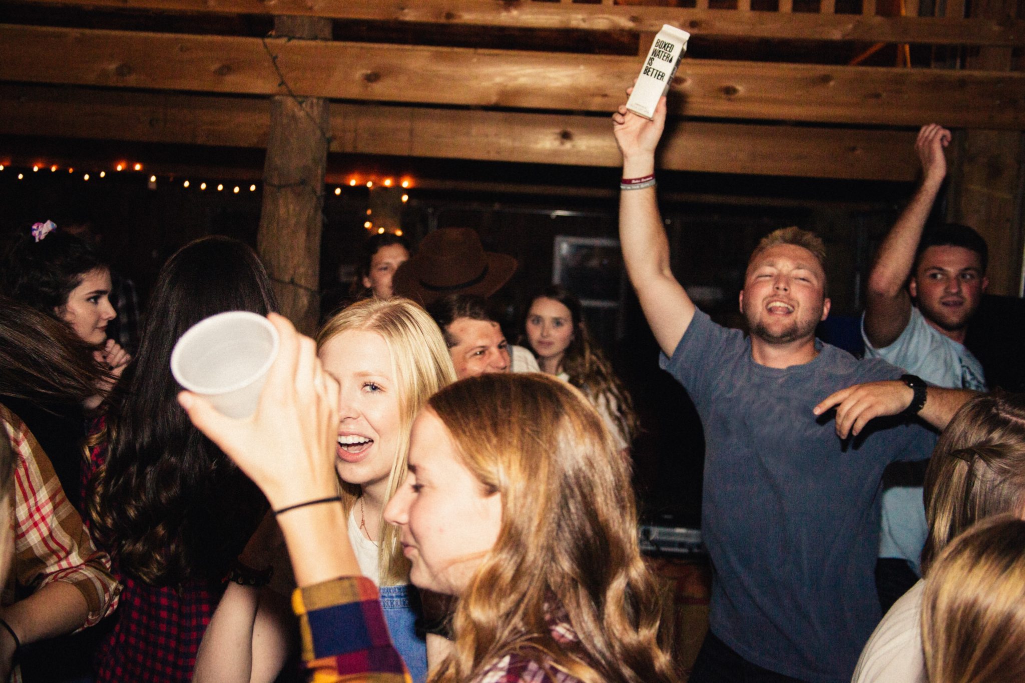 drunk crowd at a barn party