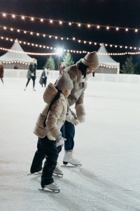woman and child ice skating