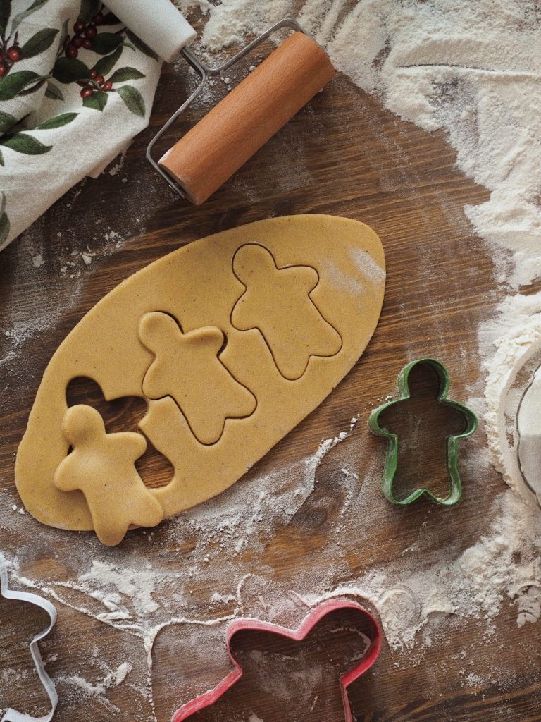 cookie dough and person-shaped cutter