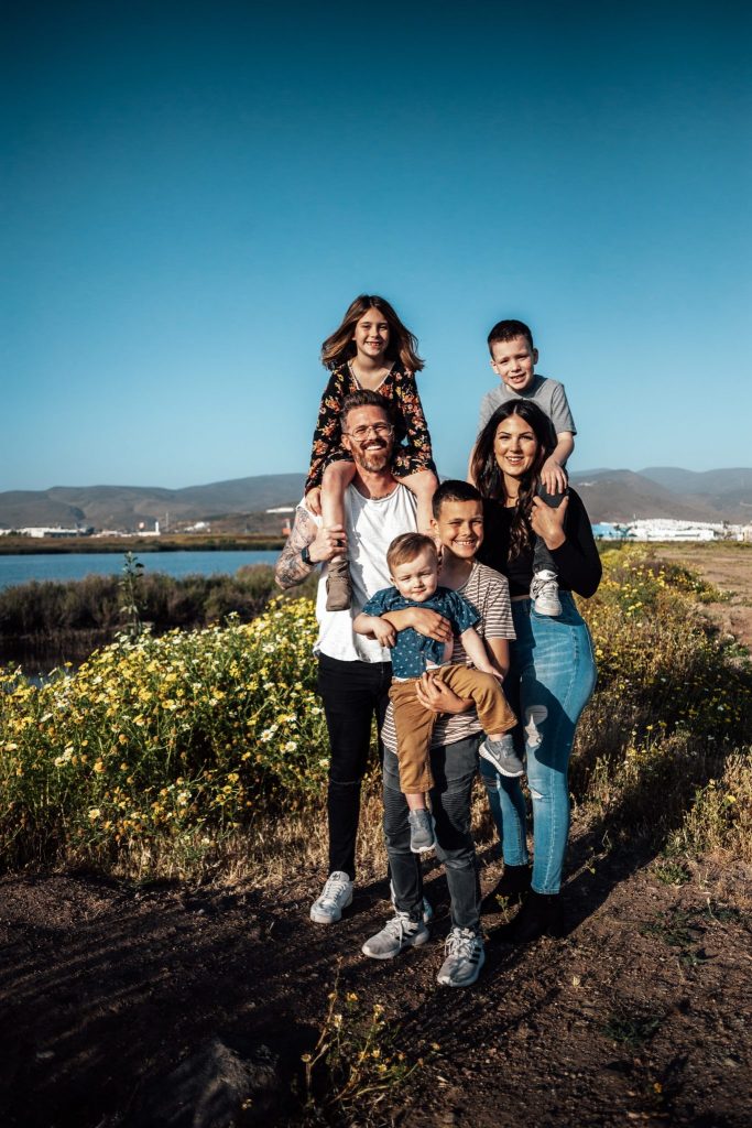 family on a vacation with both older and younger kids