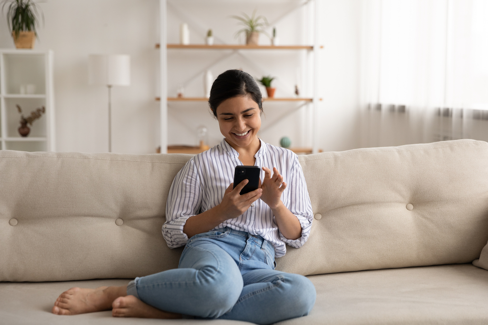 happy woman on her phone