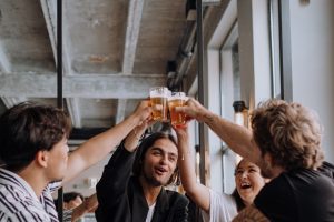 friends raising glasses in a toast