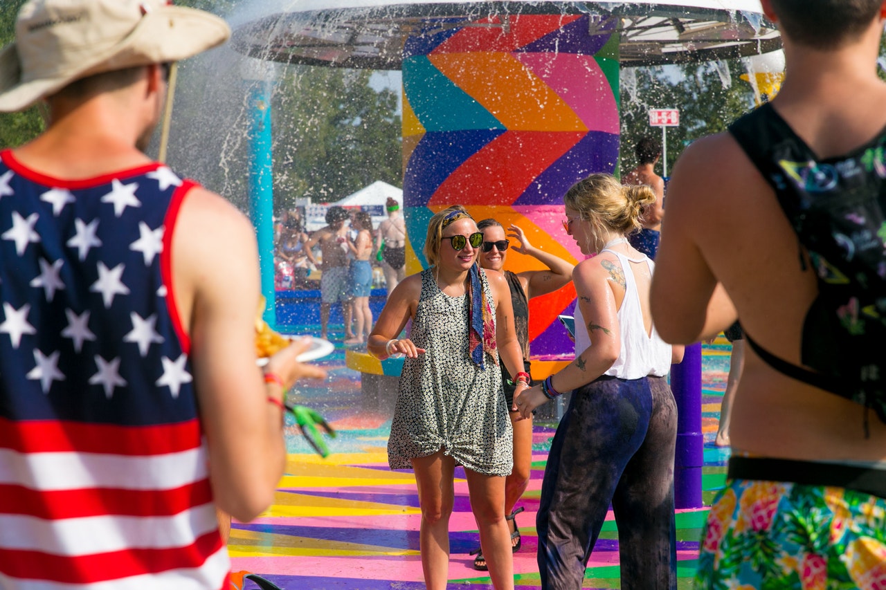 adults at colorful outdoor water park