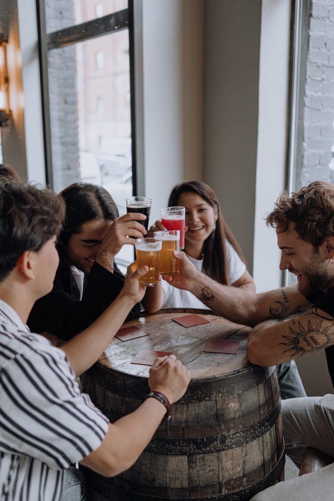 friends raising glasses in a toast