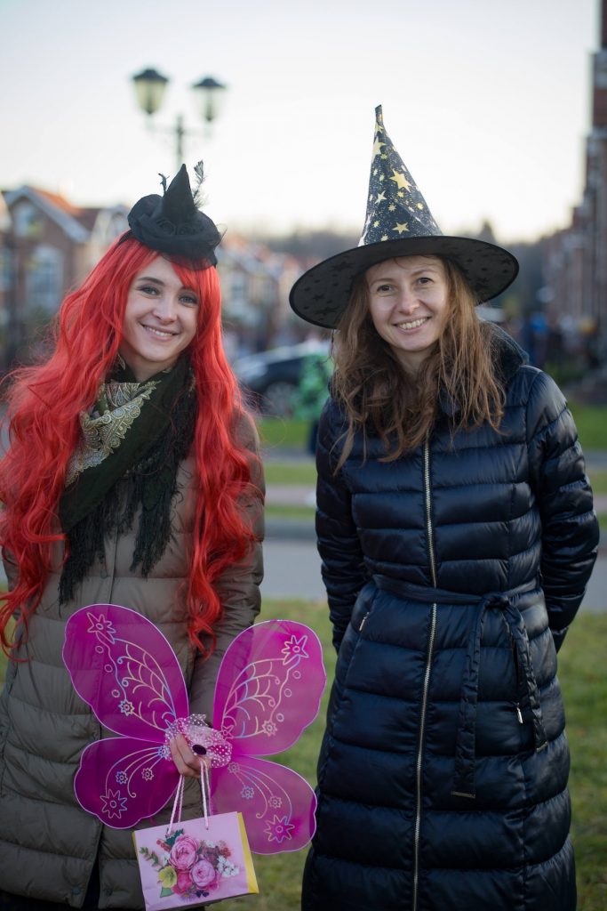 two women in halloween costumes during the daytime