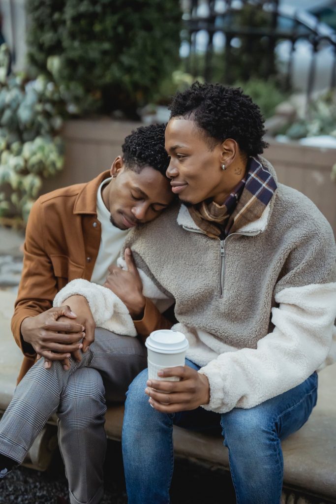 couple drinking coffee and cuddling day date